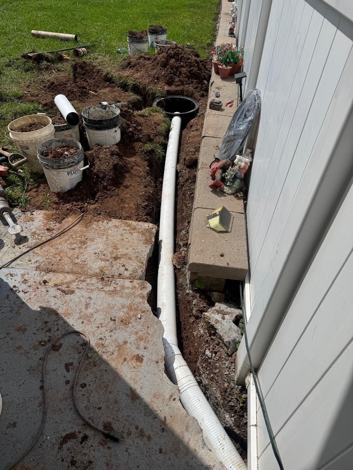 Downspout drainage work by Green Force Property Services